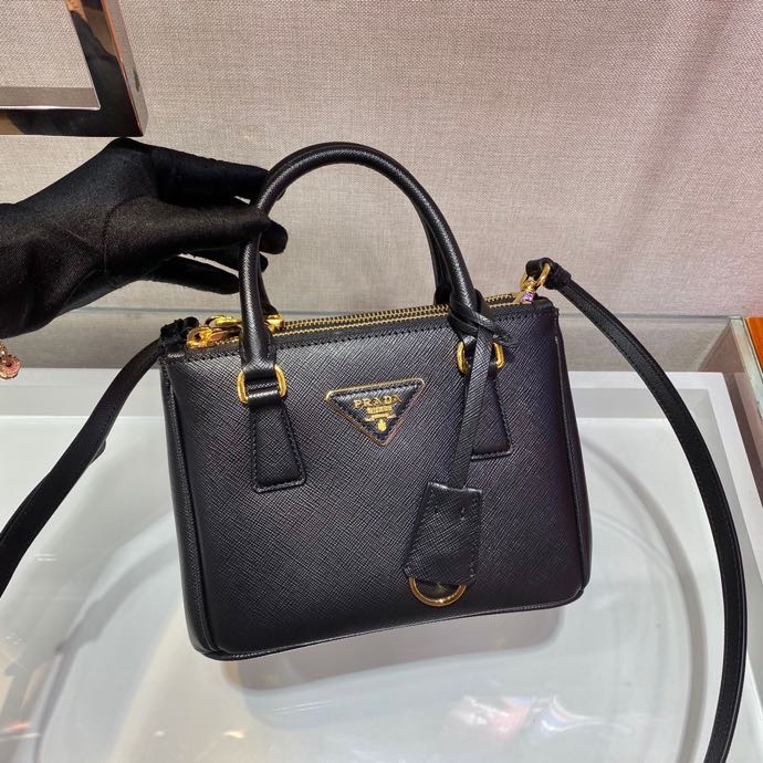 Pra*a top handle bags
